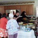 Filling up plates of food